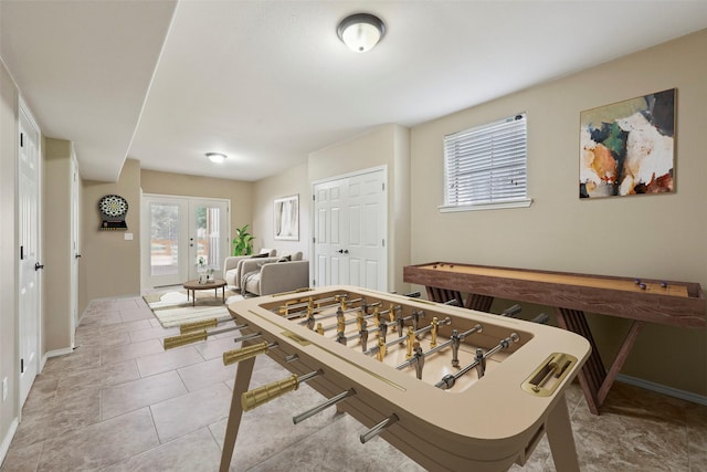 243 Riverbirch, Brookeland, TX 75931 - rec room featuring healthy amount of natural light and french doors