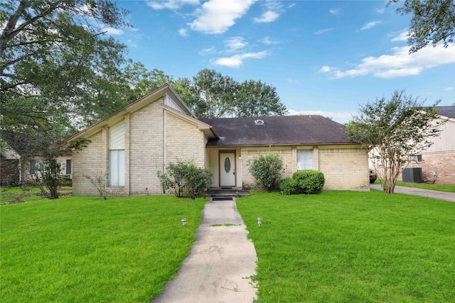 15615 Sandy Hill Dr, Houston, TX 77084 - view of front of home with a front lawn and brick siding