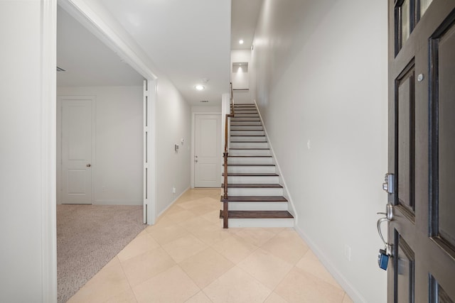 2803 Rusk St, Houston, TX 77003 - foyer featuring stairs, recessed lighting, and light colored carpet