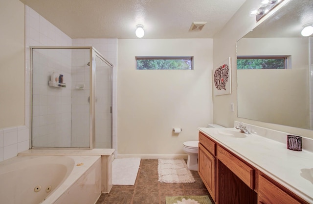 1010 Forestburg Dr, Spring, TX 77386 - full bath featuring a jetted tub, a stall shower, vanity, and a textured ceiling