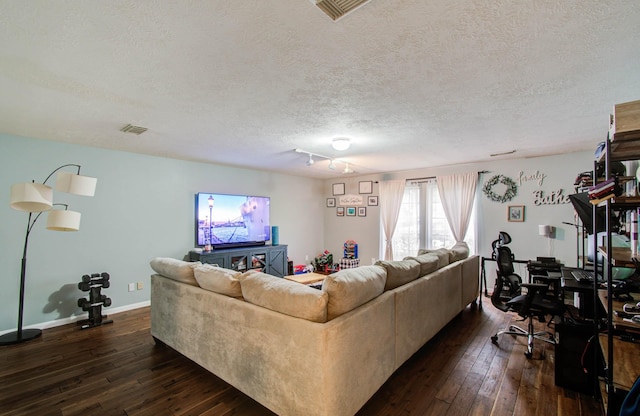1010 Forestburg Dr, Spring, TX 77386 - living area with dark wood-style floors and a textured ceiling