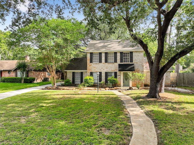 8214 Camborne Ln, Houston, TX 77070 - view of front of property featuring brick siding