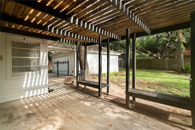 8214 Camborne Ln, Houston, TX 77070 - view of patio with an outdoor structure and a pergola
