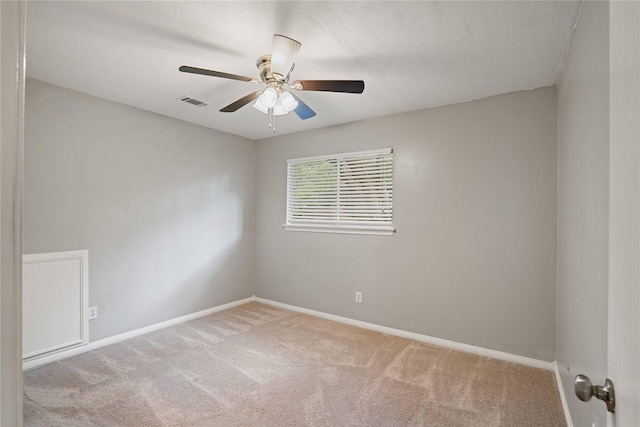 8214 Camborne Ln, Houston, TX 77070 - carpeted empty room with baseboards and ceiling fan