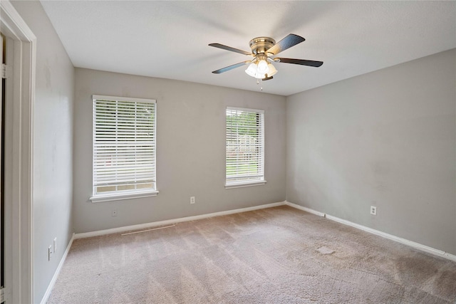 8214 Camborne Ln, Houston, TX 77070 - carpeted spare room with baseboards and ceiling fan