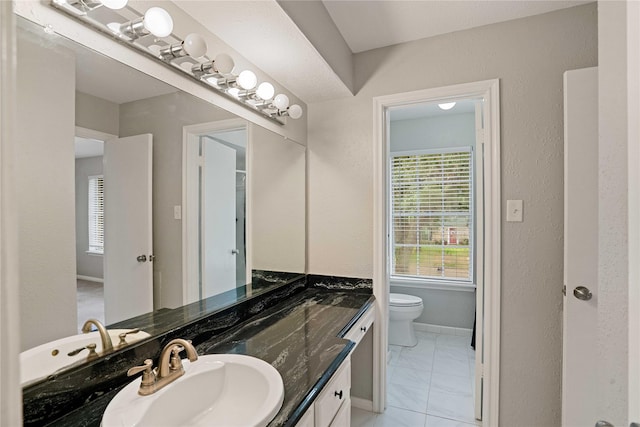 8214 Camborne Ln, Houston, TX 77070 - bathroom with vanity and marble look tiles