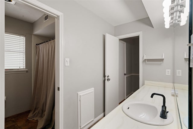 8214 Camborne Ln, Houston, TX 77070 - full bath with double vanity and a shower with shower curtain