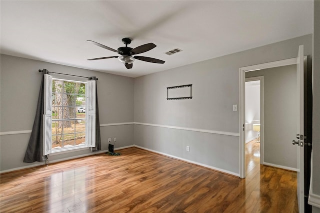 8214 Camborne Ln, Houston, TX 77070 - unfurnished room featuring ceiling fan and wood finished floors