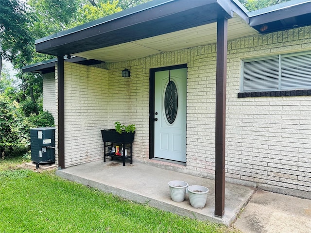 107 Southern Oaks Dr, Lake Jackson, TX 77566 - doorway to property featuring brick siding