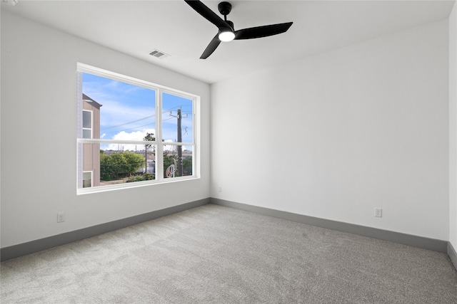 2948 Pitzlin St, Houston, TX 77023 - carpeted empty room featuring a ceiling fan and baseboards