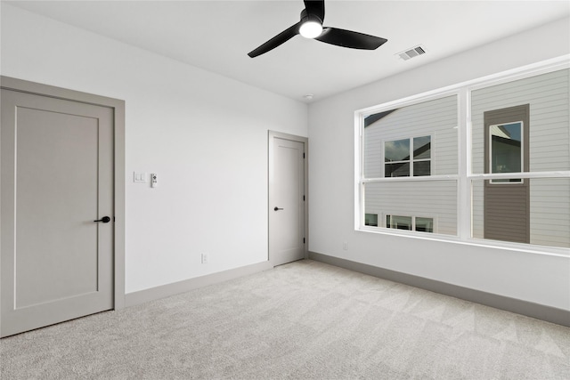 2948 Pitzlin St, Houston, TX 77023 - carpeted empty room with ceiling fan and baseboards