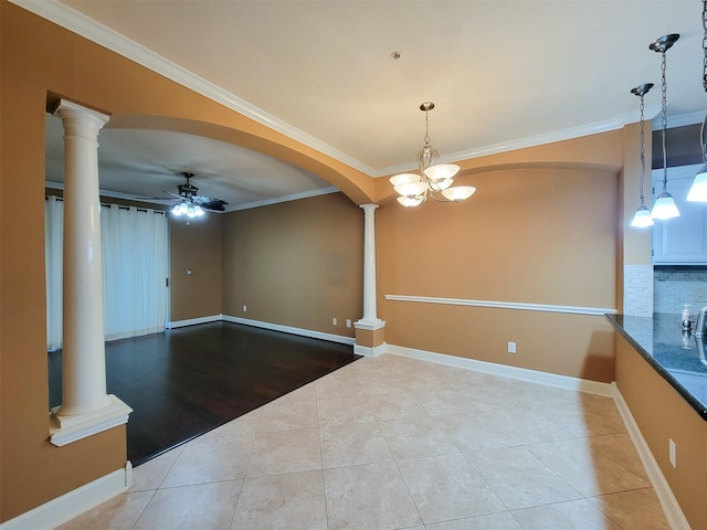2111 Welch St Unit B109, Houston, TX 77019 - tiled spare room featuring decorative columns, ceiling fan, arched walkways, and ornamental molding