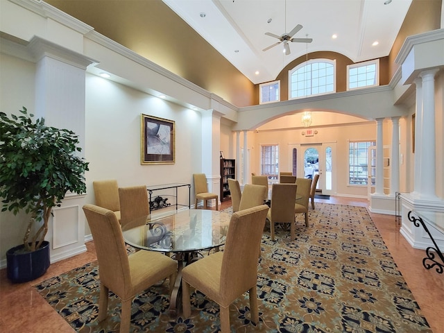 2111 Welch St Unit B109, Houston, TX 77019 - dining space with ornate columns, arched walkways, recessed lighting, high vaulted ceiling, and ceiling fan
