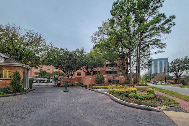 2111 Welch St Unit B109, Houston, TX 77019 - view of street featuring a gate, a residential view, and curbs