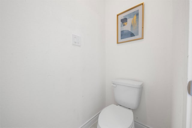 5214 Sherman St, Houston, TX 77011 - bathroom with toilet and baseboards