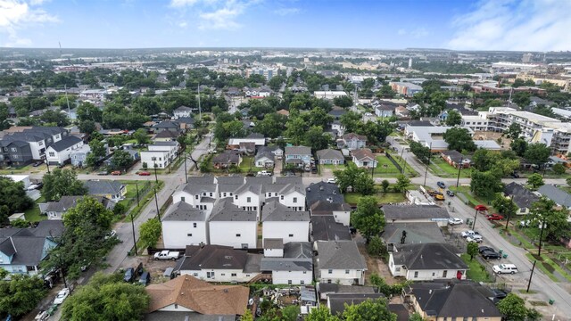 5214 Sherman St, Houston, TX 77011 - aerial view of property and surrounding area featuring nearby suburban area