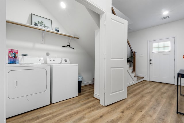 5214 Sherman St, Houston, TX 77011 - washroom with washer and clothes dryer, light wood-style flooring, and recessed lighting