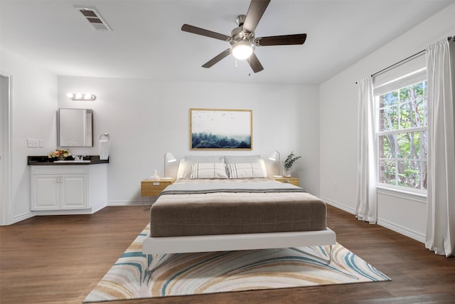 2800 Jeanetta St Unit 1206, Houston, TX 77063 - bedroom featuring dark wood finished floors and ceiling fan