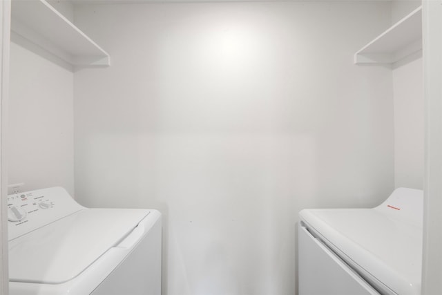 2800 Jeanetta St Unit 1206, Houston, TX 77063 - washroom with washer and dryer