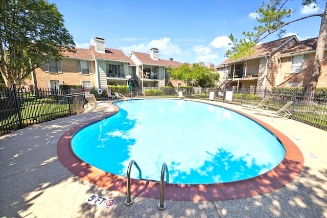 2800 Jeanetta St Unit 1206, Houston, TX 77063 - community pool featuring a residential view