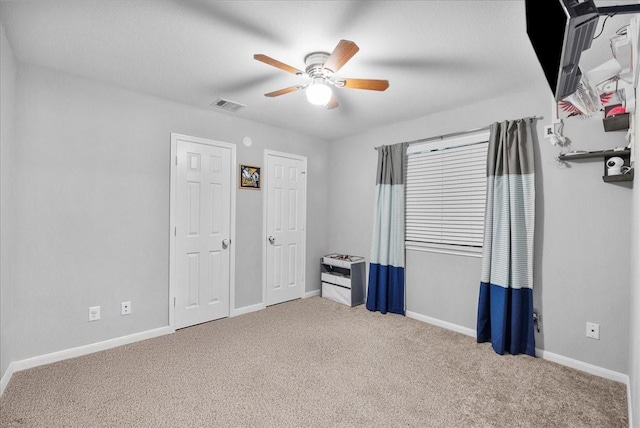 2424 Santiago Ln, League City, TX 77573 - unfurnished bedroom with carpet flooring and ceiling fan