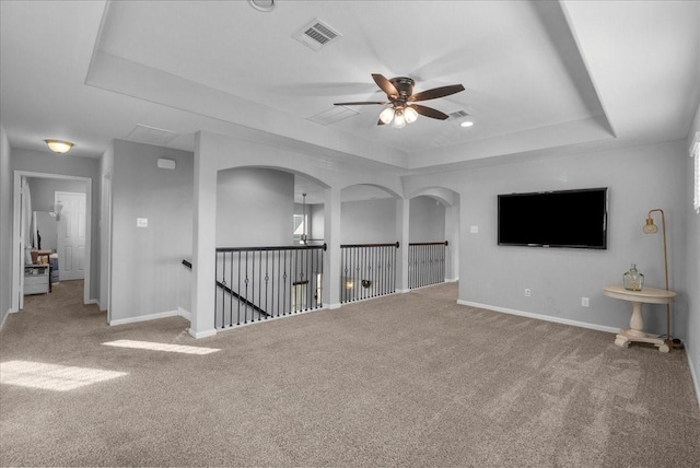 2424 Santiago Ln, League City, TX 77573 - unfurnished room with a tray ceiling, a ceiling fan, and carpet floors