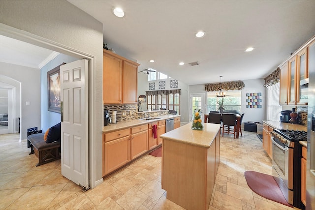 6027 Stone Trail Ln, Spring, TX 77379 - kitchen with stainless steel appliances, light countertops, a kitchen island, recessed lighting, and light brown cabinets