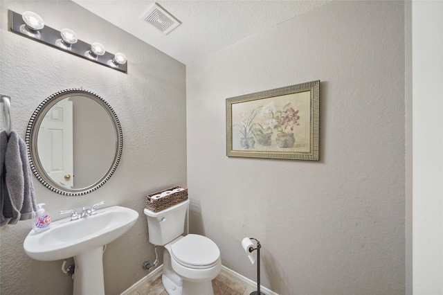 6027 Stone Trail Ln, Spring, TX 77379 - half bathroom with toilet and baseboards