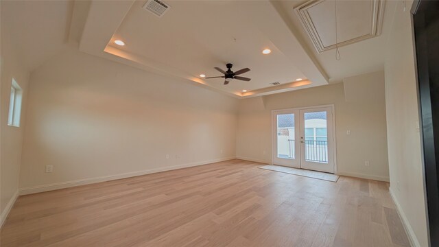 1844 Colquitt St, Houston, TX 77098 - spare room featuring attic access, recessed lighting, light wood finished floors, a ceiling fan, and french doors