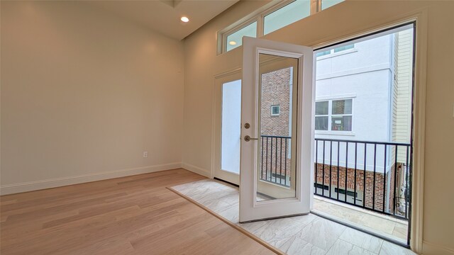 1844 Colquitt St, Houston, TX 77098 - doorway to outside with wood finished floors, plenty of natural light, and recessed lighting