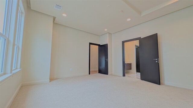 1844 Colquitt St, Houston, TX 77098 - unfurnished bedroom with light colored carpet, recessed lighting, and ensuite bathroom