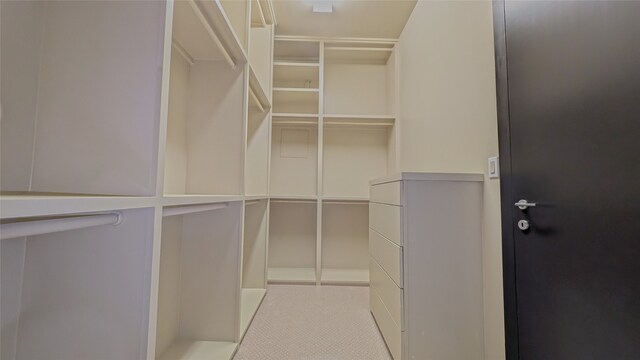 1844 Colquitt St, Houston, TX 77098 - walk in closet with tile patterned flooring