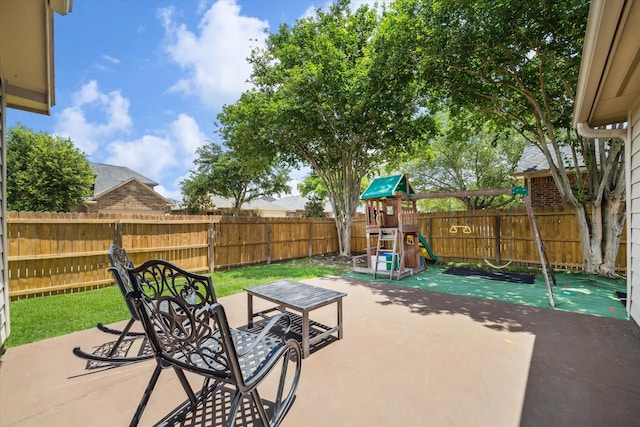 2826 Lakecrest Forest Dr, Katy, TX 77493 - fenced backyard featuring a playground and a patio area