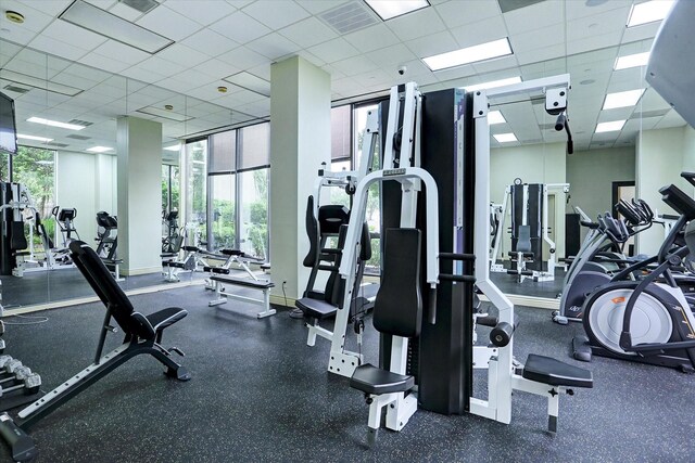 5150 Hidalgo St Unit 1303, Houston, TX 77056 - exercise room with a paneled ceiling