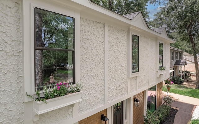 7922 Kleingreen Ln, Spring, TX 77379 - view of side of property featuring stucco siding