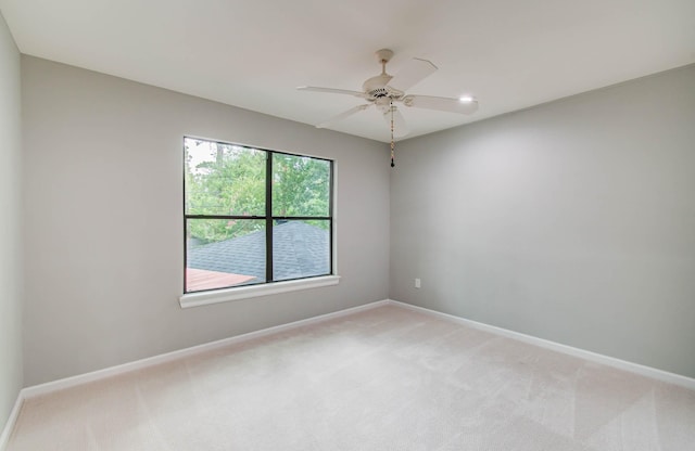 7922 Kleingreen Ln, Spring, TX 77379 - empty room with light carpet and a ceiling fan