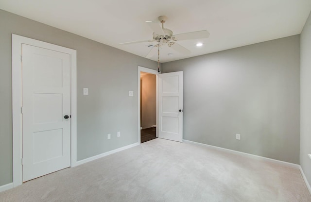 7922 Kleingreen Ln, Spring, TX 77379 - unfurnished bedroom featuring light carpet, recessed lighting, and ceiling fan