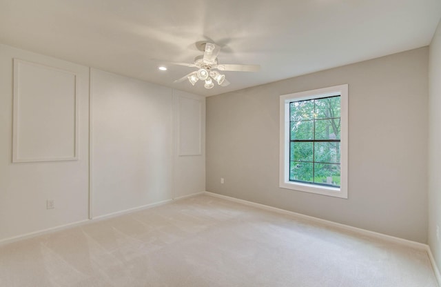 7922 Kleingreen Ln, Spring, TX 77379 - spare room featuring light colored carpet, ceiling fan, and recessed lighting