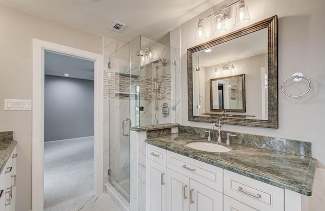 7922 Kleingreen Ln, Spring, TX 77379 - bathroom with marble finish floors, vanity, a marble finish shower, and recessed lighting
