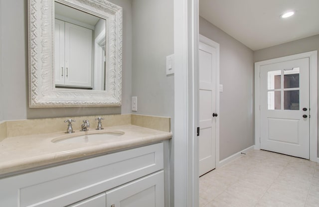 7922 Kleingreen Ln, Spring, TX 77379 - bathroom featuring vanity, recessed lighting, and tile patterned flooring
