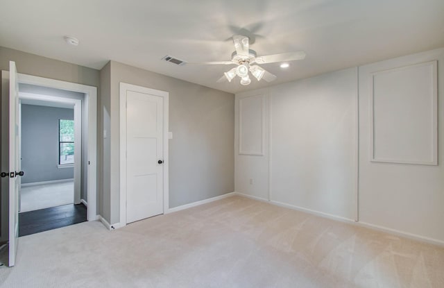7922 Kleingreen Ln, Spring, TX 77379 - unfurnished bedroom with light colored carpet, ceiling fan, and recessed lighting