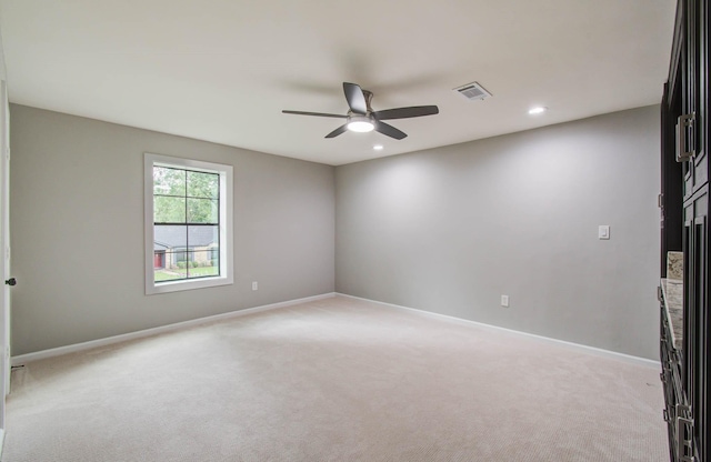7922 Kleingreen Ln, Spring, TX 77379 - unfurnished room featuring a ceiling fan, light carpet, and recessed lighting