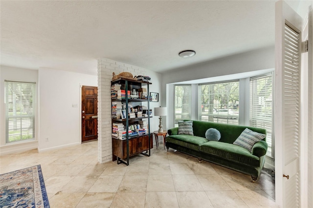 13050 Trail Hollow Dr, Houston, TX 77079 - living area with light tile patterned floors and a textured ceiling