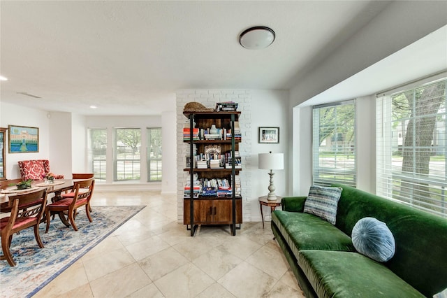 13050 Trail Hollow Dr, Houston, TX 77079 - living area with light tile patterned floors and recessed lighting