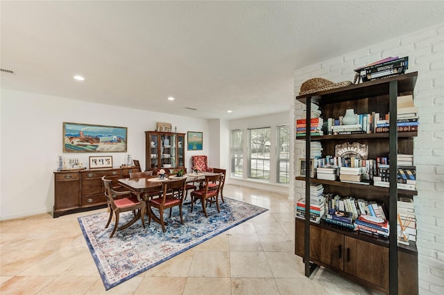 13050 Trail Hollow Dr, Houston, TX 77079 - dining room with light tile patterned floors and recessed lighting