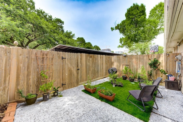 13050 Trail Hollow Dr, Houston, TX 77079 - fenced backyard with a patio area