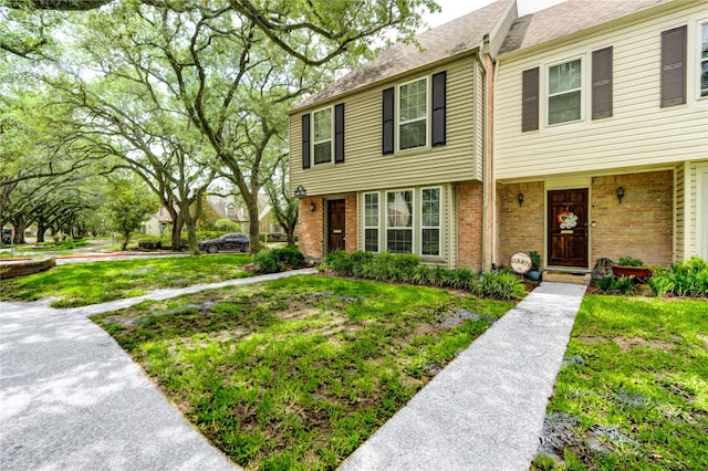 13050 Trail Hollow Dr, Houston, TX 77079 - view of front of home with brick siding and a shingled roof
