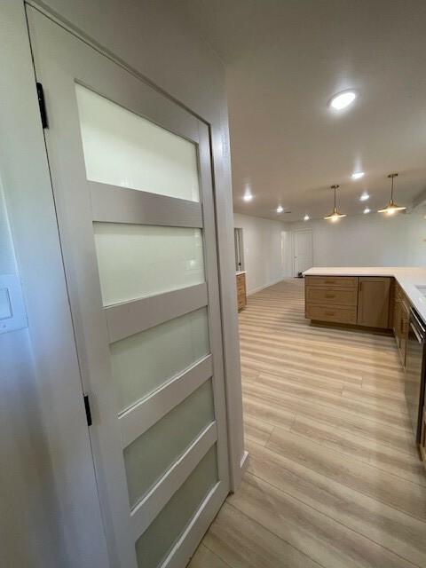 1221 N Hamilton St, Gonzales, TX 78629 - interior space featuring light wood-style flooring and recessed lighting