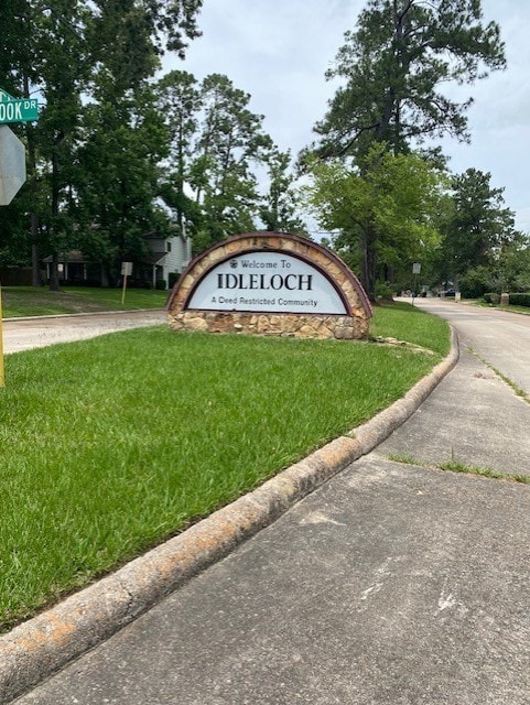 3538 Dryburgh Ct, Huffman, TX 77336 - community sign with a yard