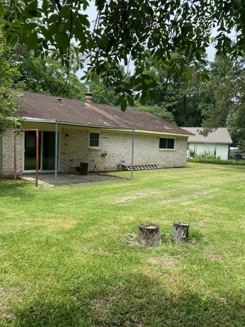 3538 Dryburgh Ct, Huffman, TX 77336 - view of green lawn with a patio area